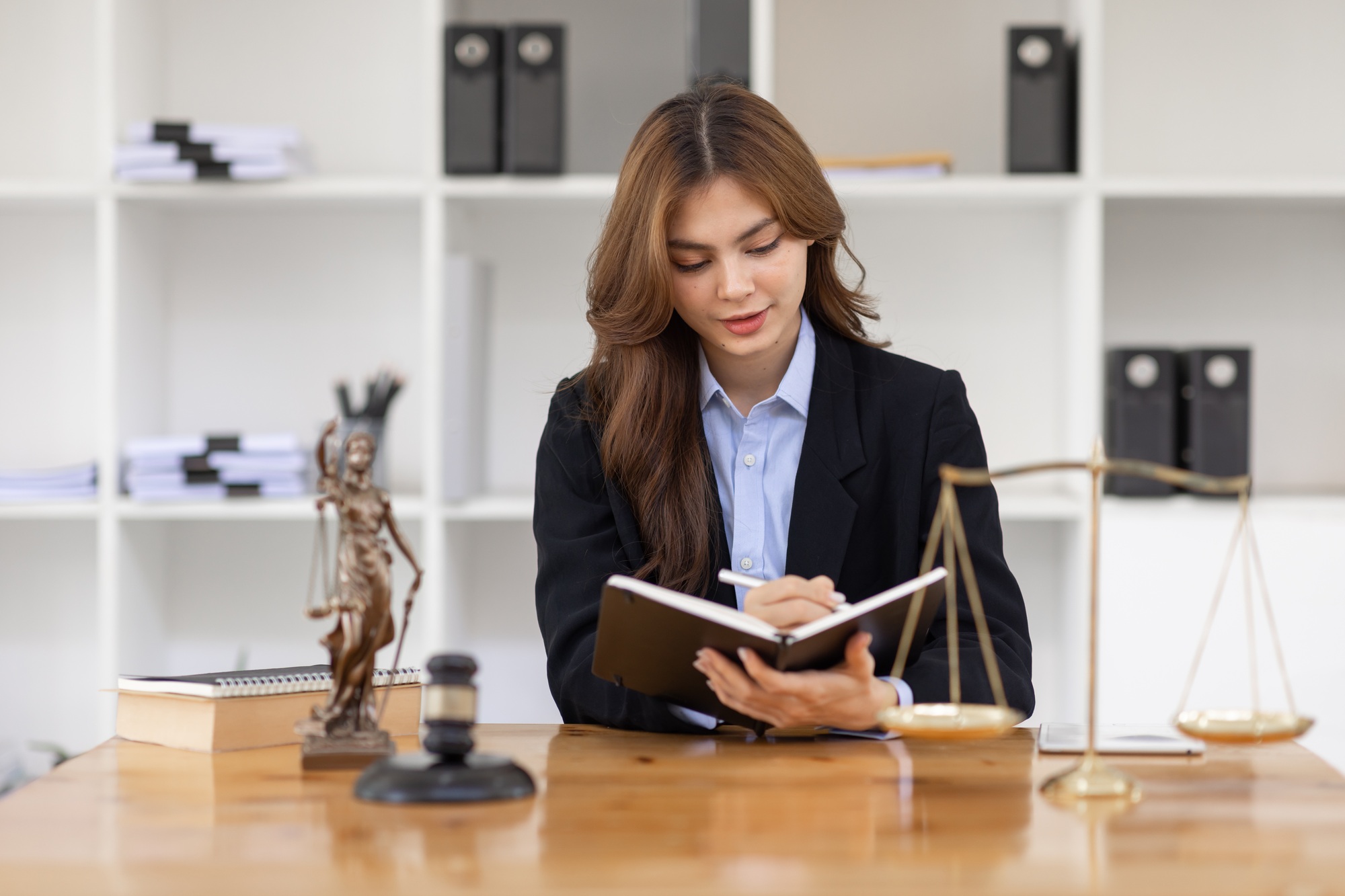 female lawyers working at the law firms. Judge gavel with scales of justice. Legal law, lawyer,